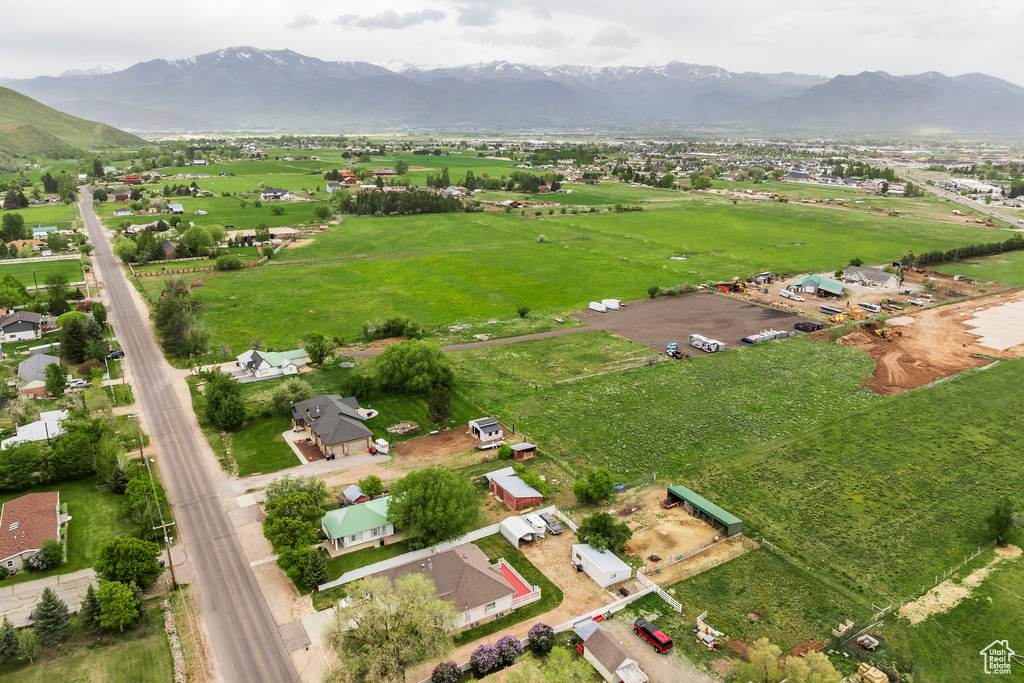 Aerial overview of property\'s location with mountains and rural landscape