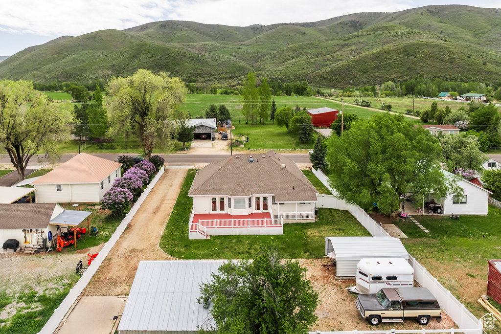 View of subject property featuring mountains