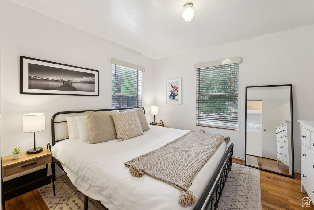 Bedroom with wood finished floors