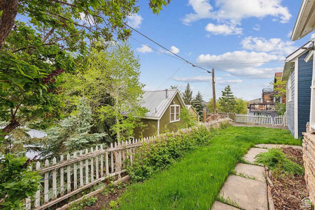 View of yard with fence