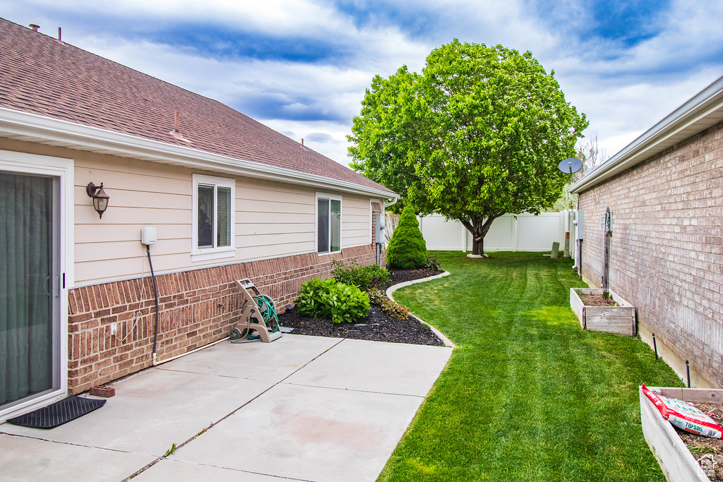 View of yard featuring a patio