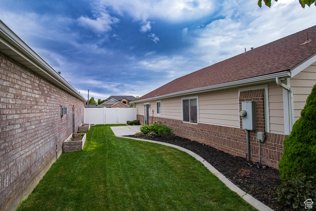 View of yard with a vegetable garden