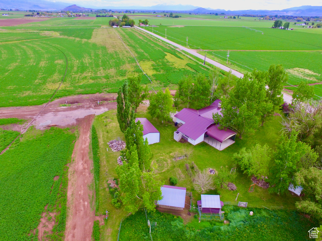 Aerial view of sparsely populated area with a mountainous background