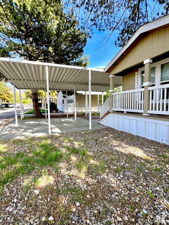 View of yard featuring a carport