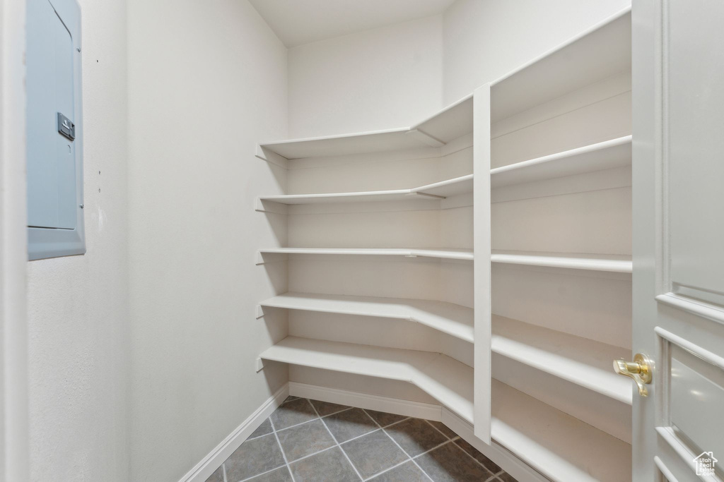 Storage area featuring electric panel