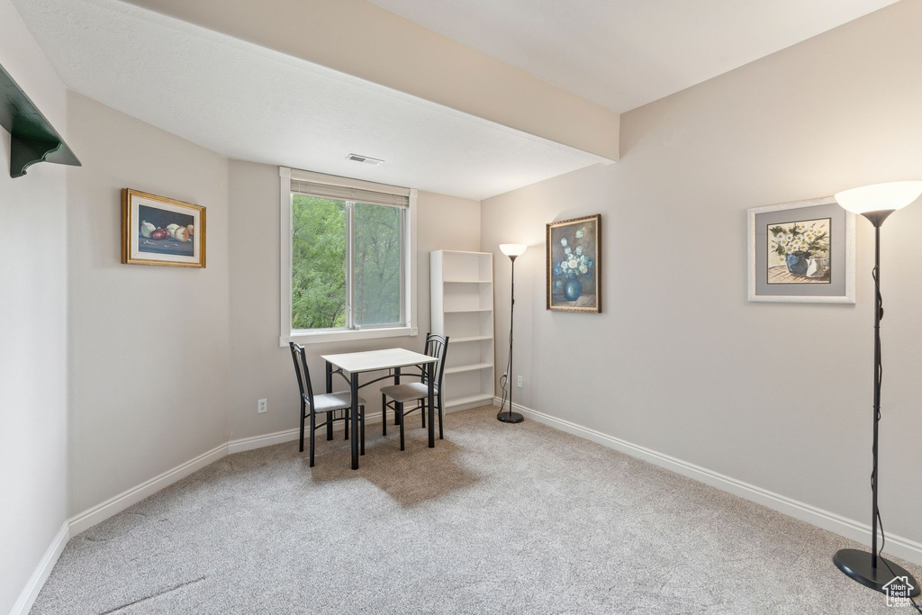 Office area with carpet floors and baseboards