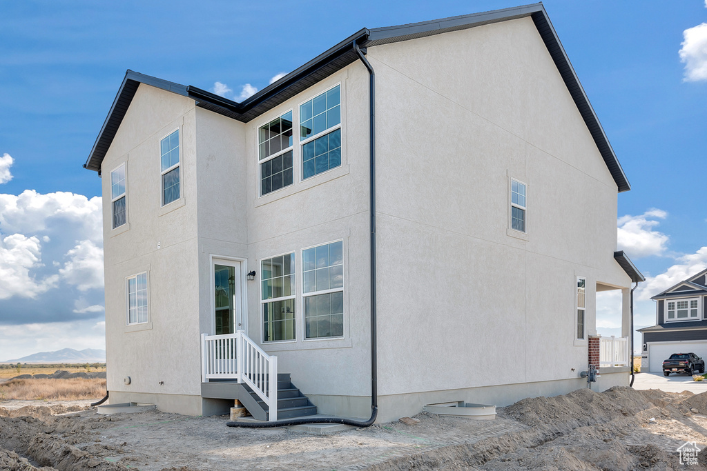 View of property exterior featuring stucco siding