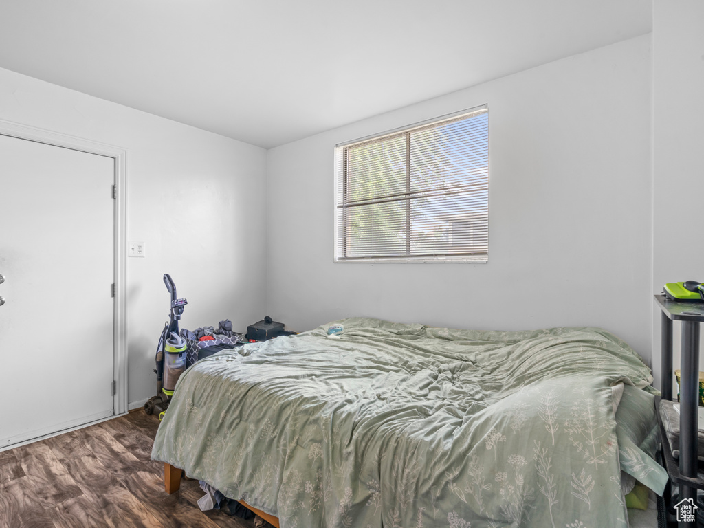 Bedroom with wood finished floors