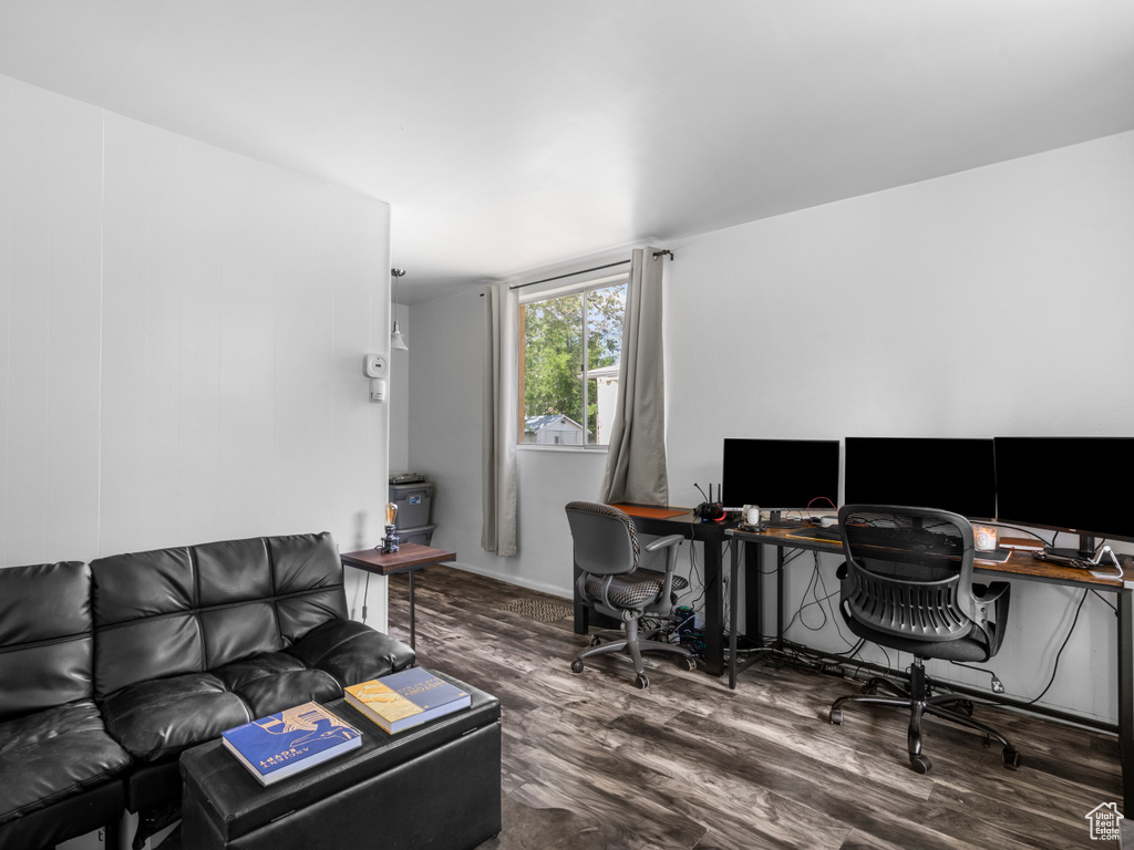 Office with wood finished floors