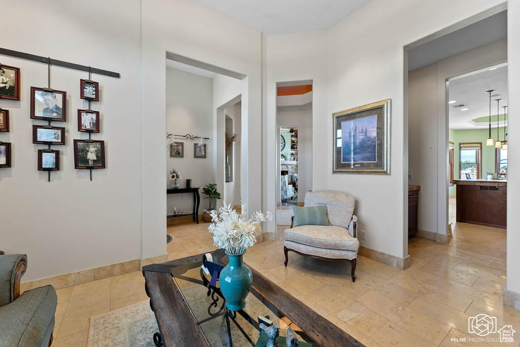 Sitting room featuring baseboards