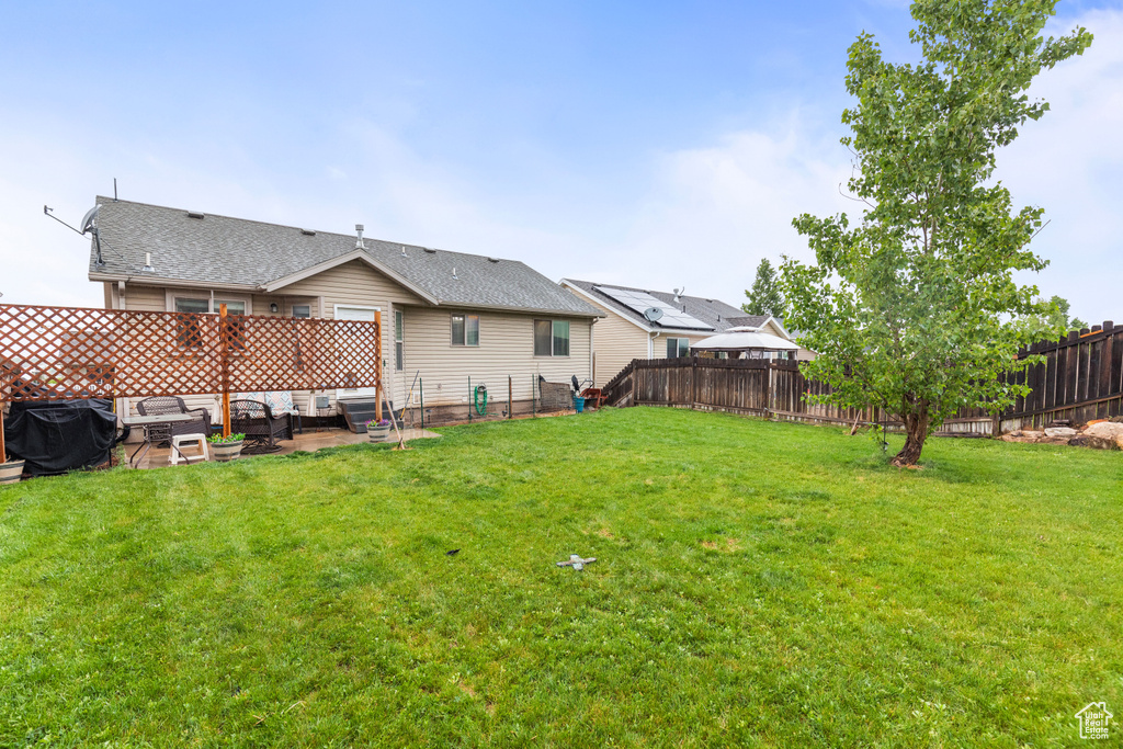 View of yard featuring an outdoor living space and a patio area