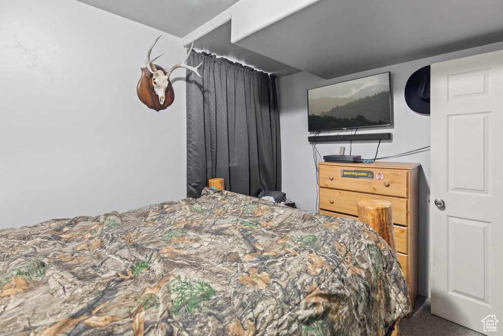Bedroom featuring carpet
