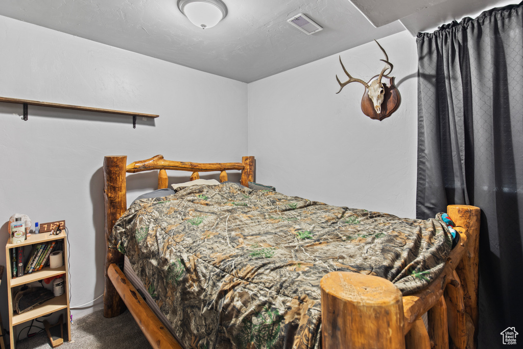 Bedroom featuring carpet flooring