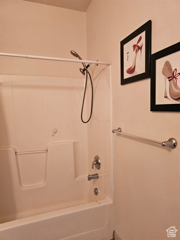 Full bathroom with shower / washtub combination