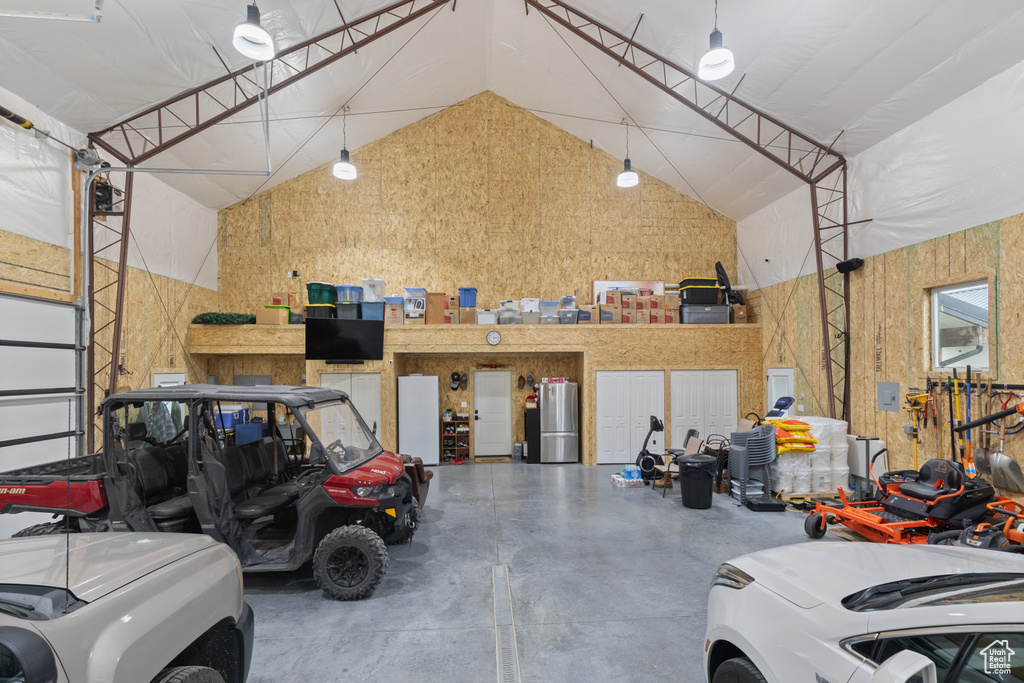 Garage with freestanding refrigerator
