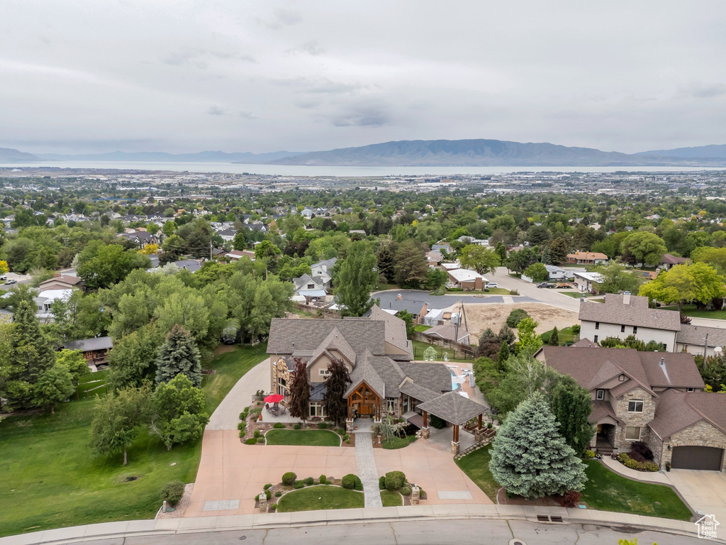 Aerial view of residential area with a mountain backdrop