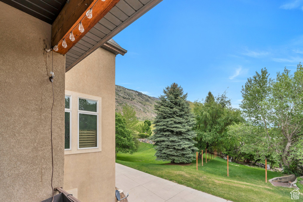View of patio / terrace with a mountain view