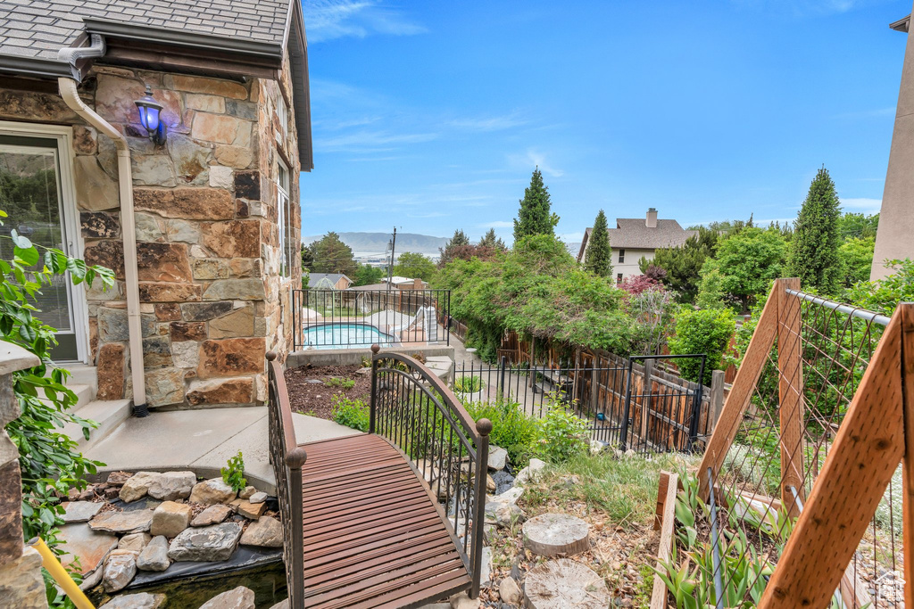 Balcony with view of pool