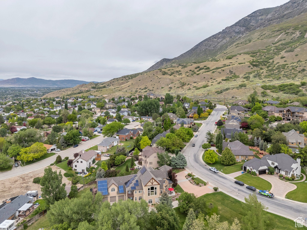 Aerial view of residential area with a mountain backdrop