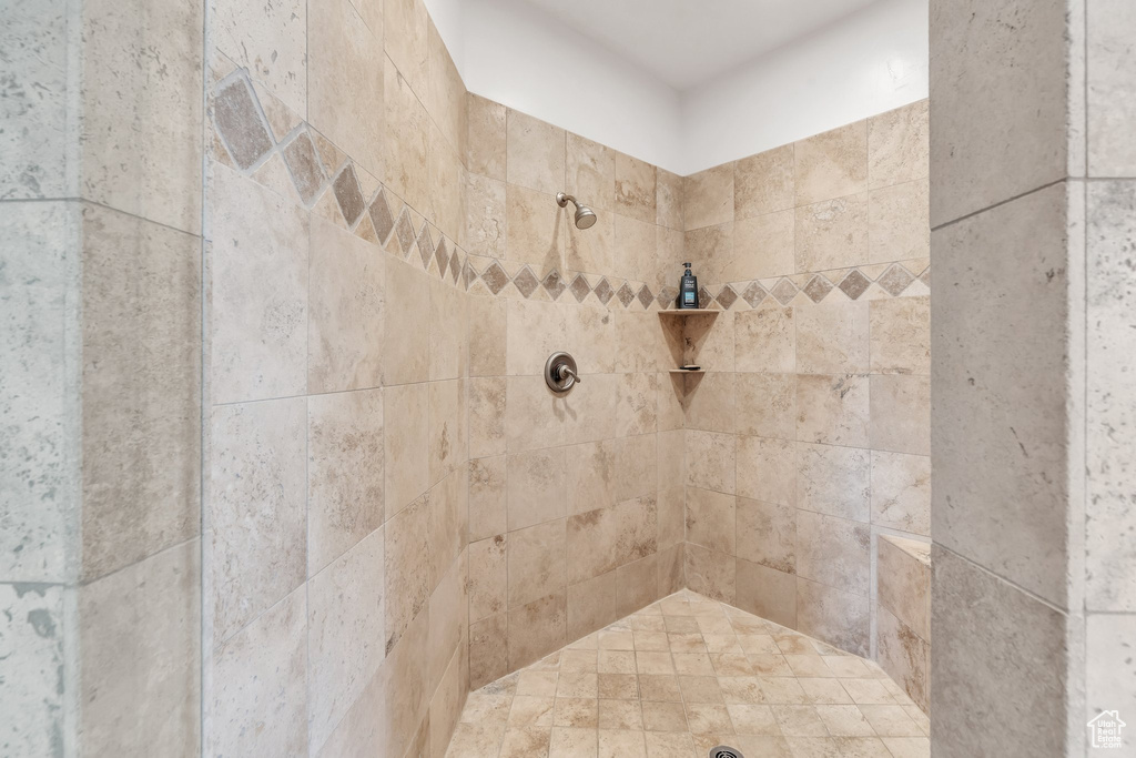 Full bath with tiled shower