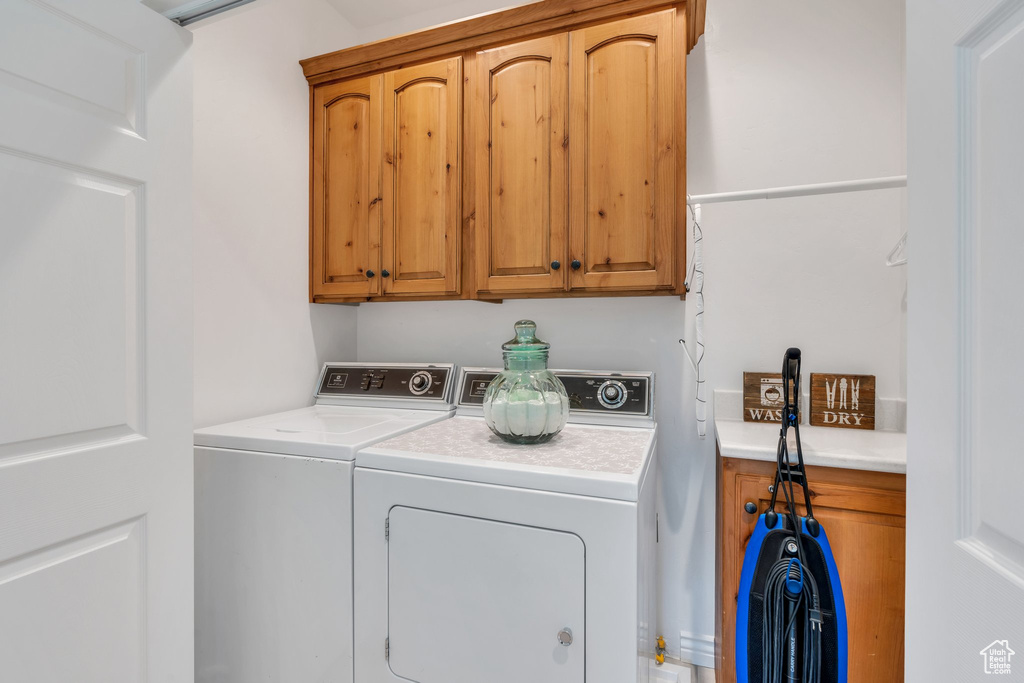 Washroom with independent washer and dryer and cabinet space