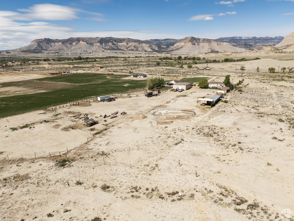 View of mountain backdrop featuring rural landscape and a desert landscape