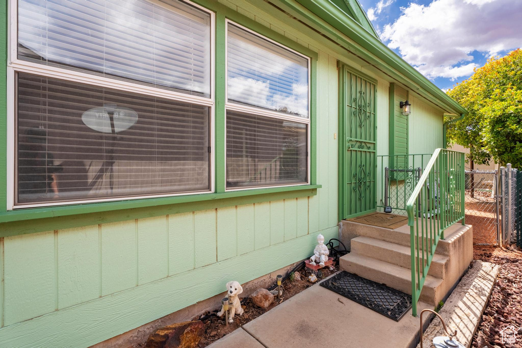 Entrance to property with fence