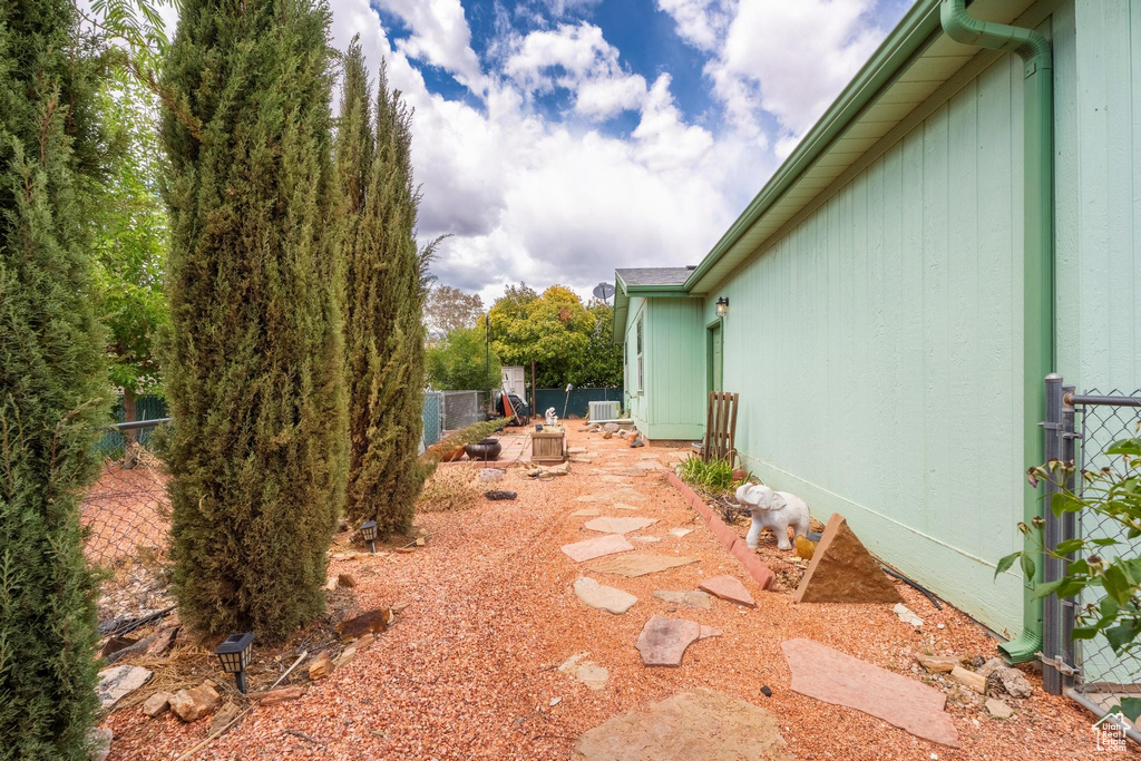 View of yard with fence