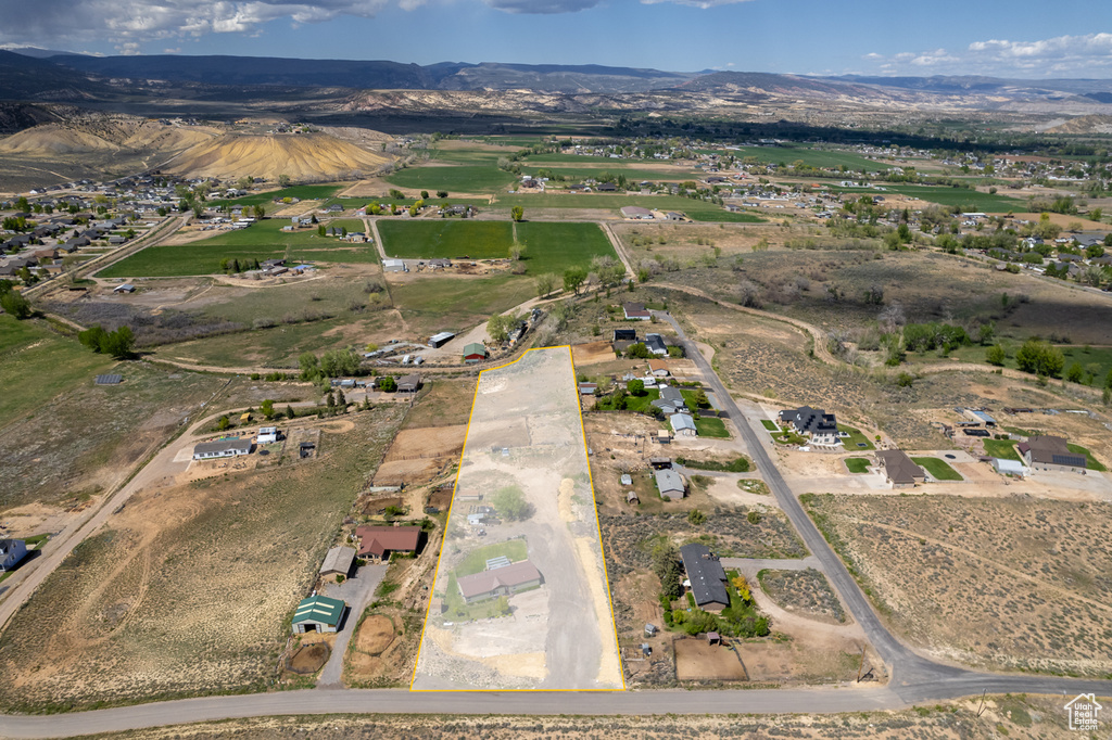 Aerial overview of property\'s location featuring mountains
