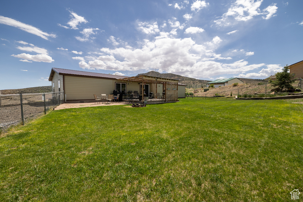 View of yard with a patio area