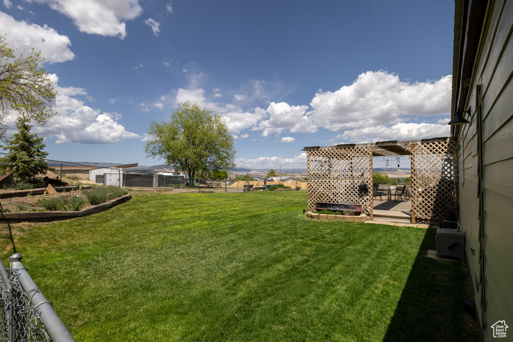 View of yard featuring a garden
