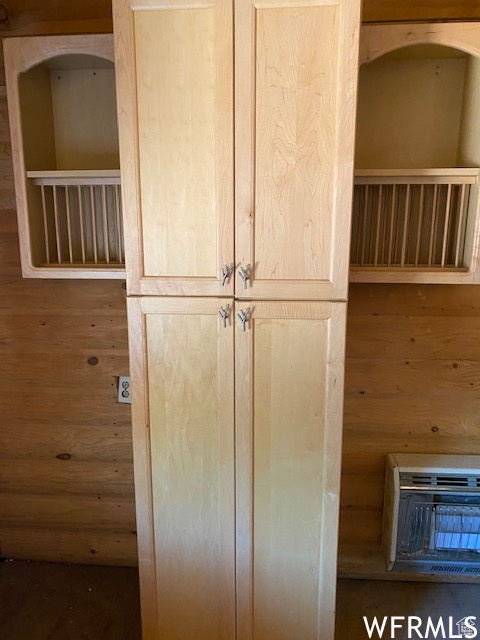 Closet featuring heating unit