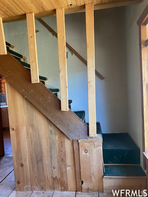 Staircase with wood ceiling