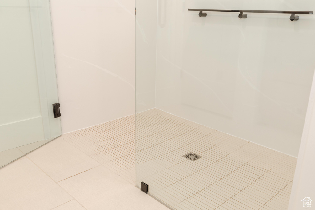 Bathroom with tile patterned flooring