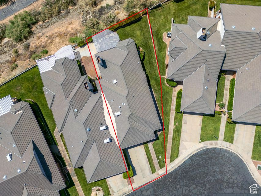 Aerial view of residential area with property parcel outlined
