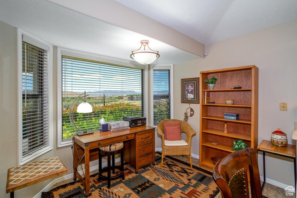 Home office featuring baseboards