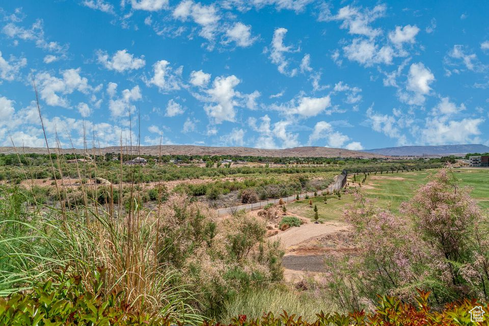 View of mountain background featuring rural landscape