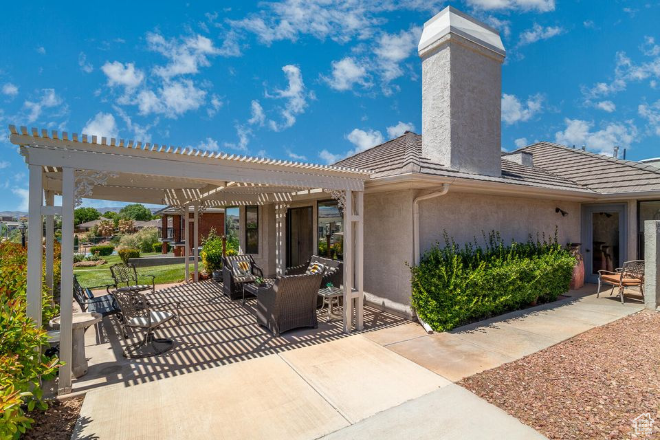 View of patio with a pergola