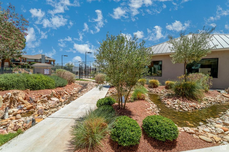 View of property's community with fence