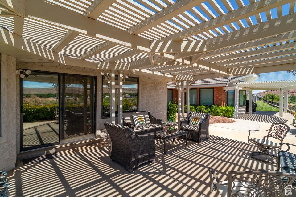 View of patio / terrace with a pergola and outdoor lounge area