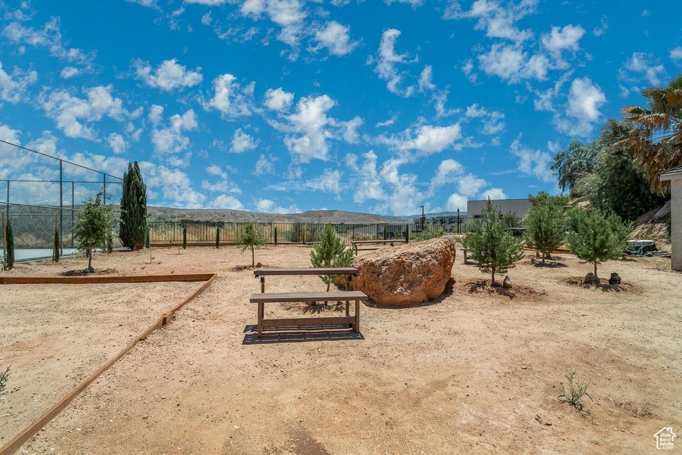 View of yard with fence