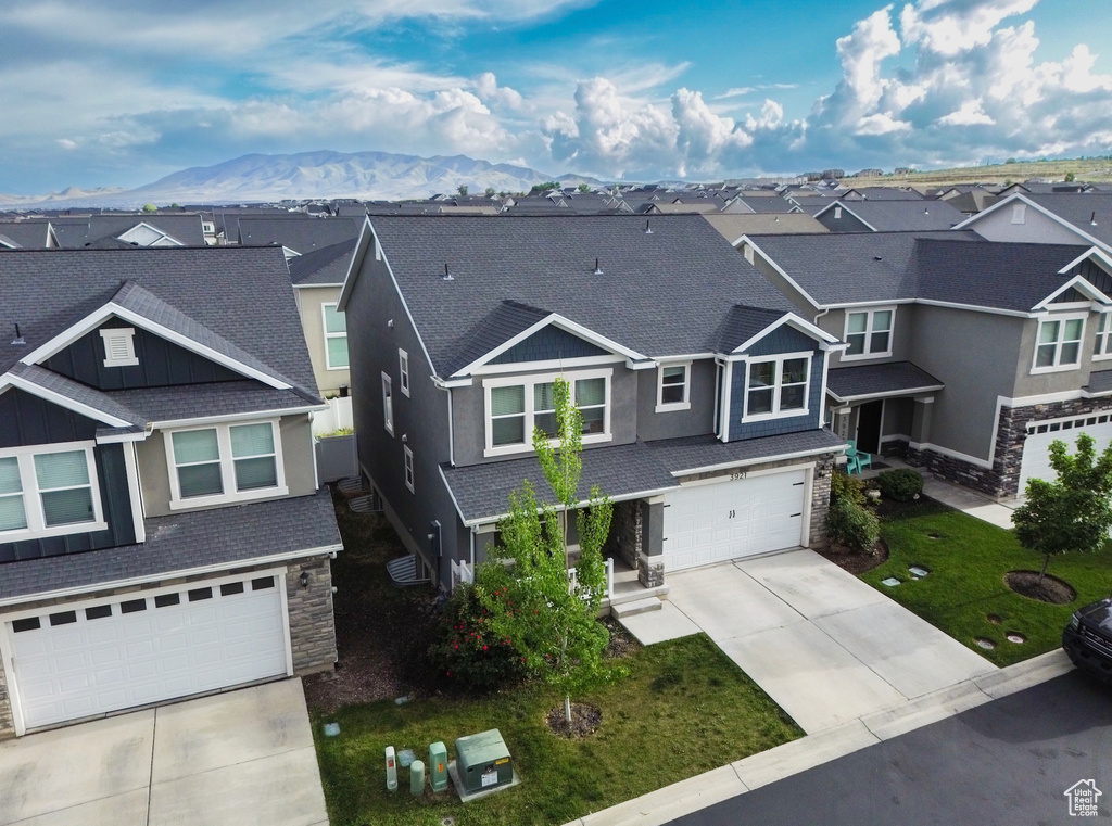 Aerial perspective of suburban area with mountains
