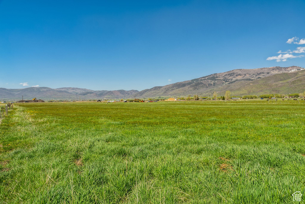 View of mountain background with rural landscape and a pastoral area