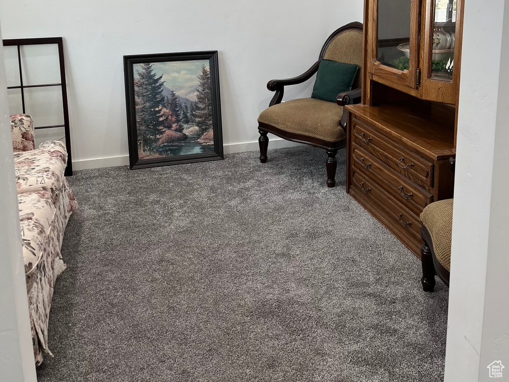 Bedroom with baseboards and carpet