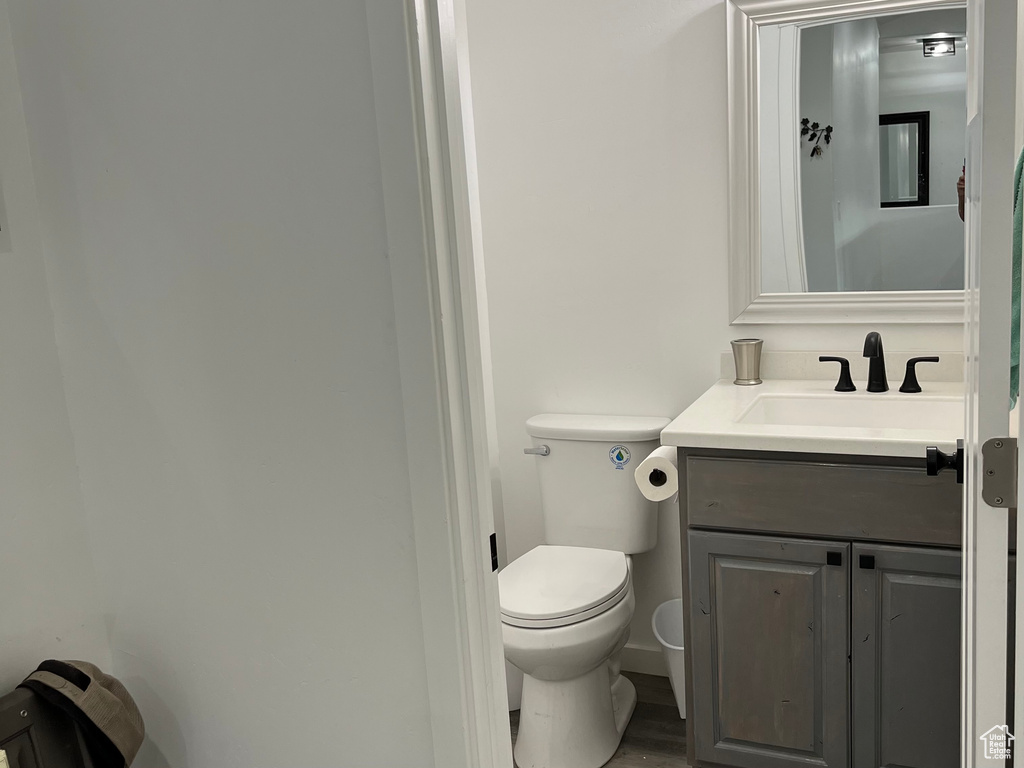 Bathroom with toilet and vanity