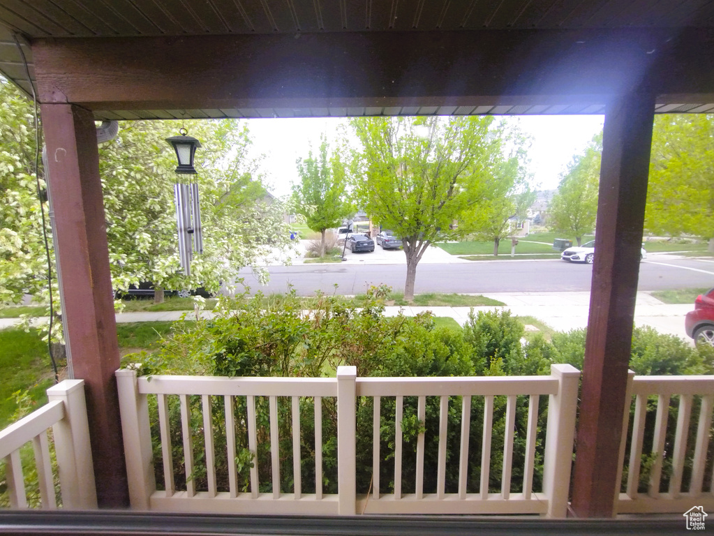Wooden deck featuring covered porch
