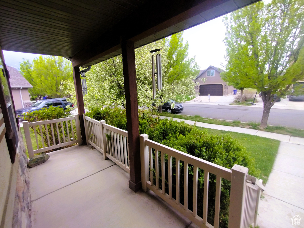 View of patio featuring covered porch