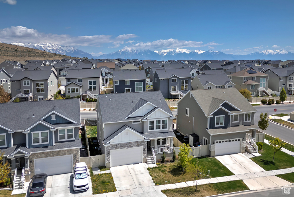 Drone / aerial view with a mountain view and a residential view