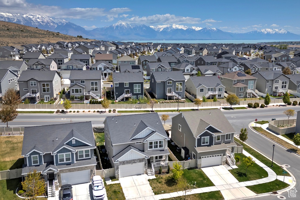 Drone / aerial view with a residential view and a mountain view