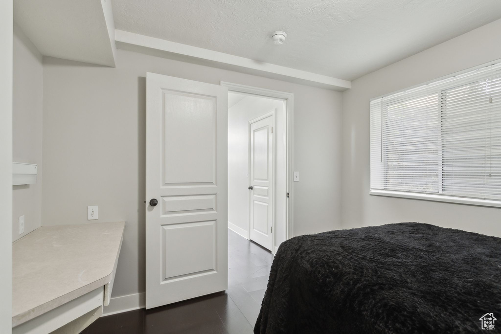 Bedroom featuring baseboards